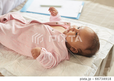 Cute Baby on Examination Table 66738918