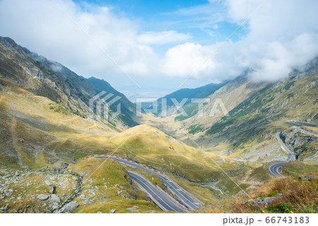 Transfagarasan road with beautiful mountains landscape. Summer sunny weather in Romanian Carpathians Transfagarasan road with beautiful mountains landscape. Summer sunny weather in Romanian Carpathians 66743183