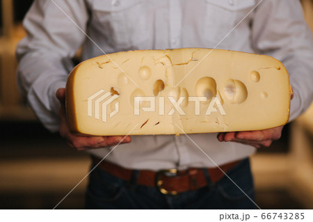 Close up of Hansome man hold big slice of...の写真素材 [66743285] - PIXTA