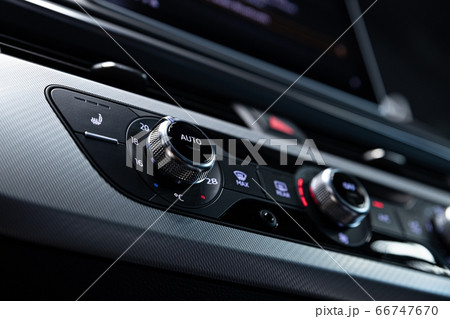 Air conditioning control panel in car. Car 66747670