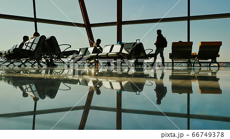 People at a modern airport, departure lounge. People at a modern airport, departure lounge. 66749378