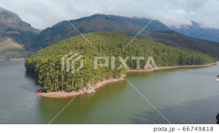 Aerial view beautiful nature with mountains and hills by Lake Mattupetty. Kerala State. Near the city of Munar. 66749818
