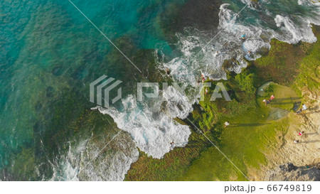 Pantai Tegal Wangi Beach, island of Bali. Indonesia. Aerial view. 66749819