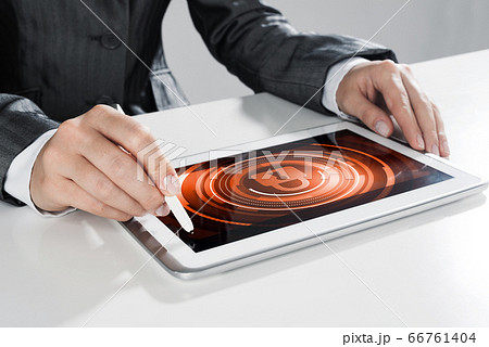 Internet security concept with woman working on media screen with stylus Internet security concept with woman working on media screen with stylus 66761404