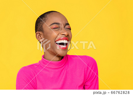 Happy optimistic African American woman laughing 66762828