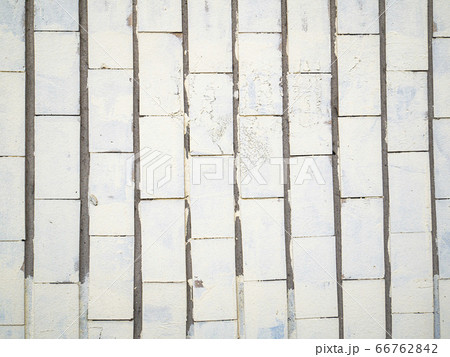 White tiled wall. Place for text. White tiled wall. Place for text. 66762842