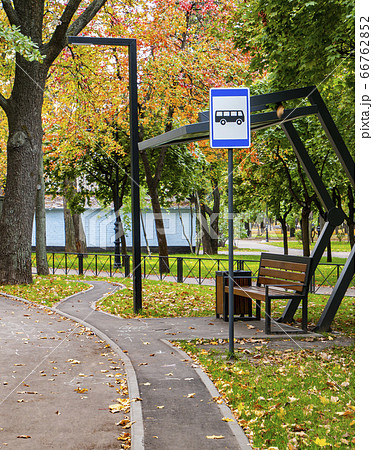 Public transport stop in the fall. 66762852