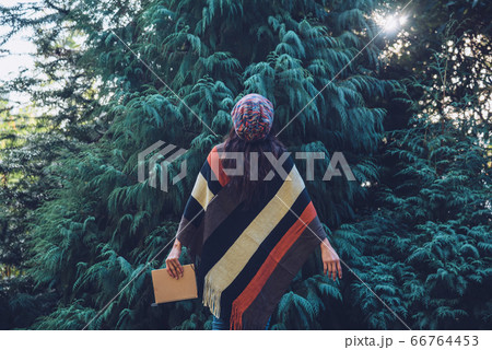 Young woman relax in the holiday. Travel nature and  write a note Happy to see the beauty 66764453