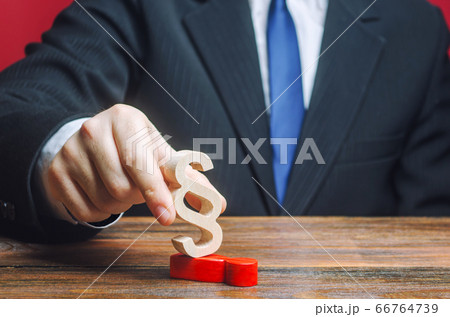 A man deals with his opponent with a paragraph figure. Suppression of dissatisfaction disagreement with new laws. Reduction of protest moods. Usurpation of power. Deserved punishment of the criminal. 66764739