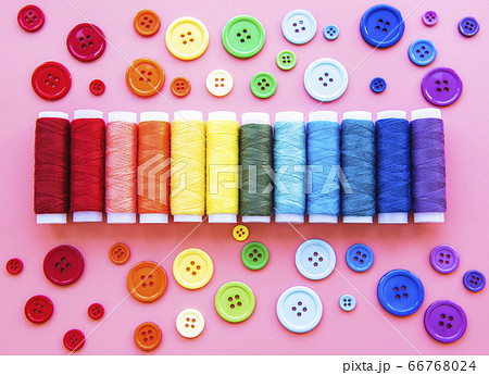 Spools of thread and buttons on the colors of the 66768024