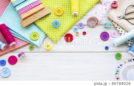 Sewing accessories on a white background 66768026
