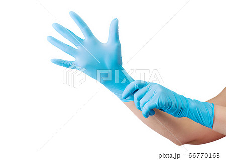 Doctor wearing a medical glove on hands isolated 66770163