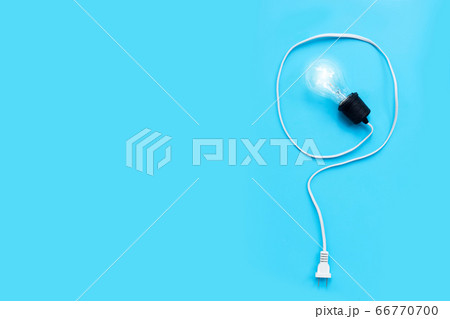 Question mark made of  light bulb on blue 66770700