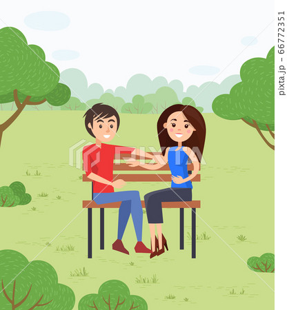 Happy Couple on Date in Park Sitting on Bench Happy Couple on Date in Park Sitting on Bench 66772351