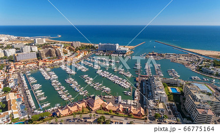 Aerial photo of the bay, Vilamoura, Quarteira, Portugal. Marina with luxury yachts. Aerial photo of the bay, Vilamoura, Quarteira, Portugal. Marina with luxury yachts. 66775164