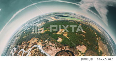Aerial View Deforestation Area Of Green Forest Woods And River Landscape In Sunny Spring Day. Deforestation Zone And Little Small Planet Concept Aerial View Deforestation Area Of Green Forest Woods And River Landscape In Sunny Spring Day. Deforestation Zone And Little Small Planet Concept 66775387