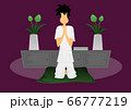 a guy holding hand pray on cushion in room 66777219
