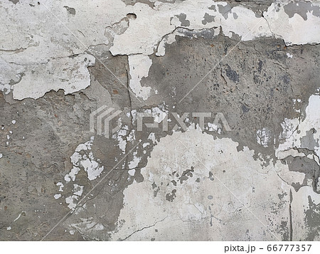 Grey Concrete Texture old wall with peeling paint and scratches Grey Concrete Texture old wall with peeling paint and scratches 66777357