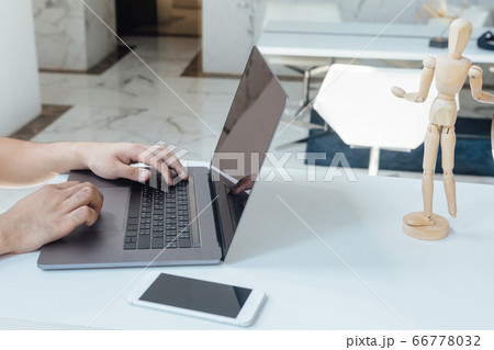 A person working from home to reduce the chance of COVID-19 coronavirus A person working from home to reduce the chance of COVID-19 coronavirus 66778032