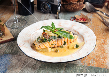 Appetizing gourmet salmon steak with creamy sauce 66782950