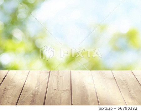 Wooden table on blurred nature green background 66790332