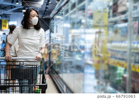 Young asian woman kid with face mask in Young asian woman kid with face mask in 66791063