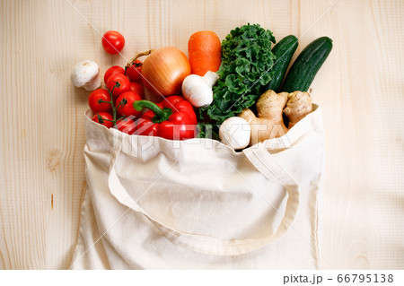 Fresh vegetables in cloth bag on light wooden Fresh vegetables in cloth bag on light wooden 66795138