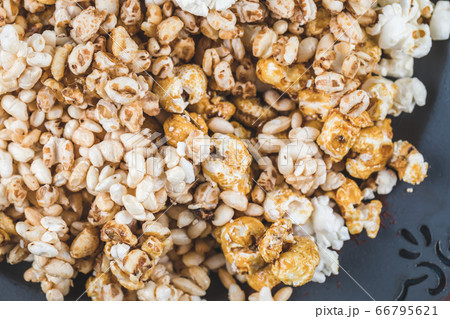 Popcorn with caramel corn and kettle corn on blue background 66795621