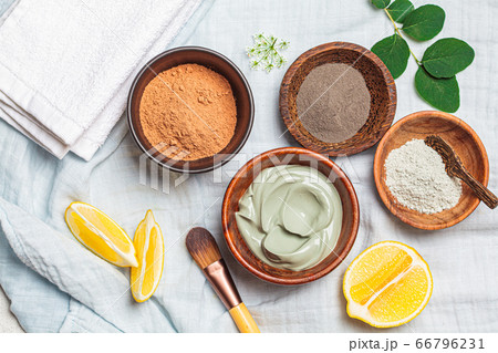 Different types of dry clay in wooden bowls 66796231
