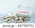 Money jar with covid19 label 66799701