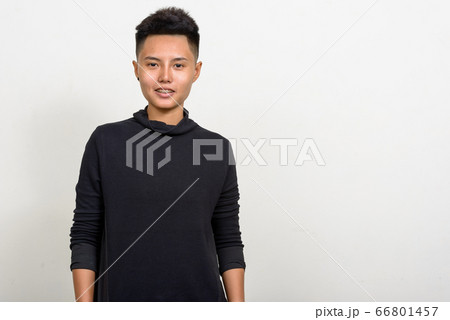 Portrait of happy young Asian lesbian woman smiling Portrait of happy young Asian lesbian woman smiling 66801457