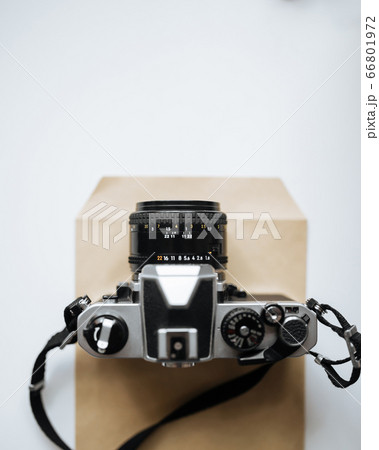 Vintage film camera on a white background Vintage film camera on a white background 66801972