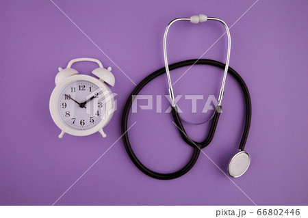 Time is important in life concept. Stethoscope kit and alarm clock 66802446
