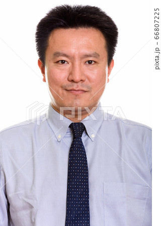 Studio shot of Japanese man isolated against white background 66807225