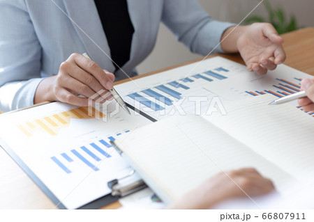 The car salesman handed the keys to the customer who passed the car purchase loan conditions ,Car rental agreement Concept. The car salesman handed the keys to the customer who passed the car purchase loan conditions ,Car rental agreement Concept. 66807911