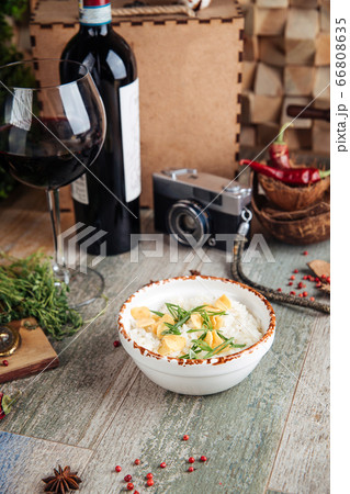Boiled white rice garnish green onion dried garlic Boiled white rice garnish green onion dried garlic 66808635