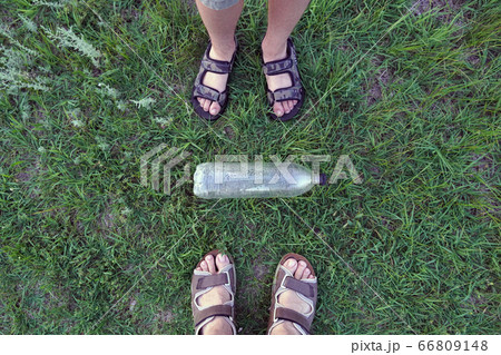 foots and used plastic bottle as garbage on the foots and used plastic bottle as garbage on the 66809148