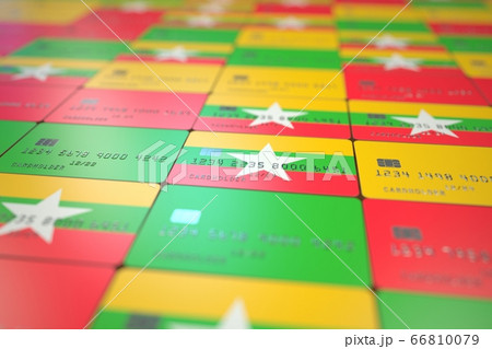 Flag of Myanmar on plastic bank cards. National banking related 3D rendering 66810079