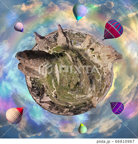 Hot Air balloons flying tour over Mountains planet of Cappadocia, Turkey. 66810967