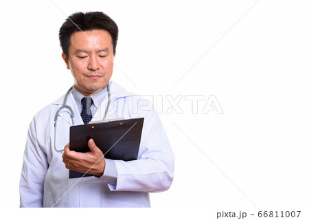 Studio shot of Japanese man isolated against white background Studio shot of Japanese man isolated against white background 66811007