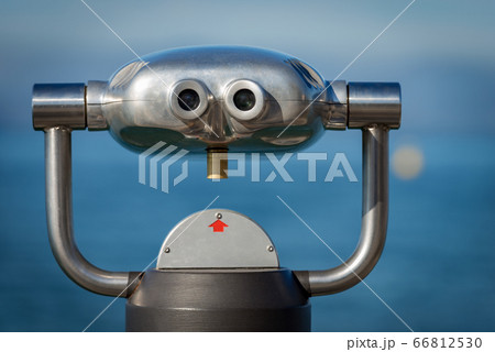 Coin operated binoculars on a blurred background - Sea and sky  66812530