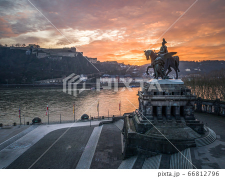 Colorful Sunrise burning sky Koblenz City historic monument German Corner where river rhine and mosele flow together Colorful Sunrise burning sky Koblenz City historic monument German Corner where river rhine and mosele flow together 66812796