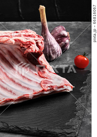 Lamb ribs fresh meat, with eco-friendly packaging. Food Delivery Concept. copy space, dark background 66816067