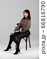 Woman in blouse and culottes on white 66816790