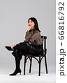 Woman in blouse and culottes on white 66816792