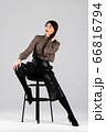 Woman in blouse and culottes on white 66816794