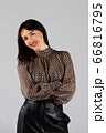 Woman in blouse and culottes on white 66816795