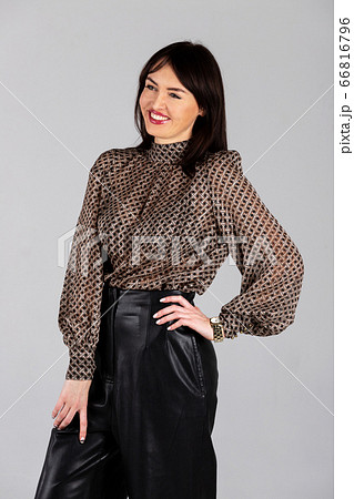 Woman in blouse and culottes on white 66816796