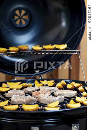 grilled tuna with potatoes on garden grill 66817164