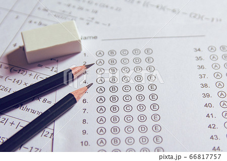 Pencil and eraser on answer sheets or Standardized 66817757